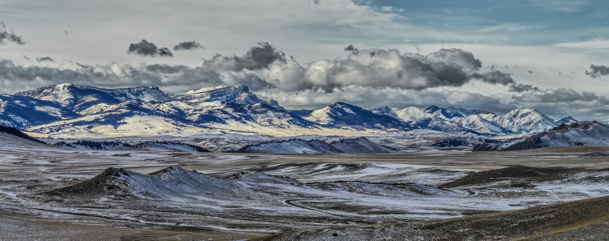 Snow-dusted mountains and rangeland in Montana